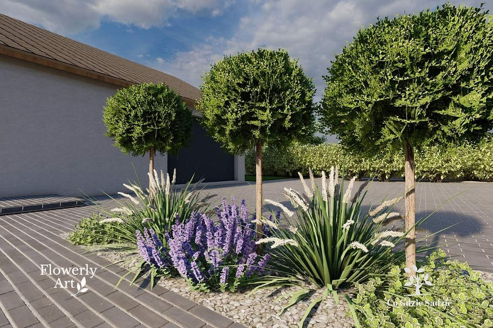 Całoroczna rabata przed domem z trawami