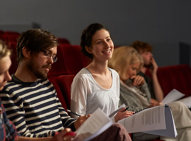 Group reading and discussing scripts