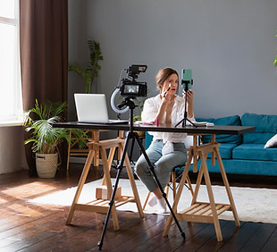 woman-making-beauty-vlog-with-her-professional-camera.jpg
