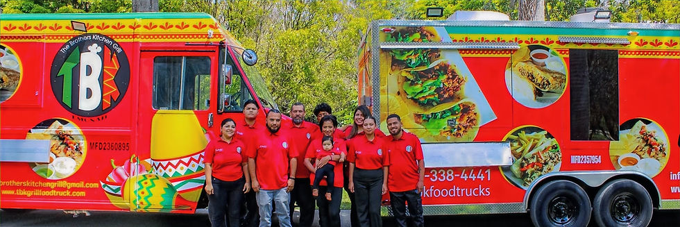 TBK Food Trucks team in red uniforms pos