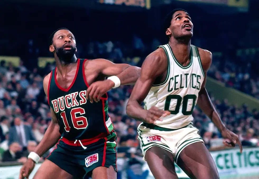 Robert Parish of the Boston Celtics battles the Milwaukee Bucks’ Bob Lanier for position during a game at Boston Garden. Photo credit: Dick Raphael, Getty Images.