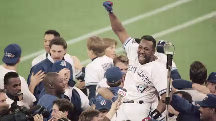 Photo: Toronto Blue Jay star Joe Carter celebrates after his walk-off home run in Game 6 of the 1993 World Series. Carter’s three-run home run off of the Philadelphia Phillies’ Mitch Williams gave the Blue Jays the 6-4 win. Photo credit: Elise Amendola, Associated Press.