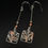 Thumbnail: Boxing Hares long drop earrings in Copper and Silver
