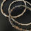 Thumbnail: Wrapped Bangle. Solid Silver with Gold Plated Copper Wrap
