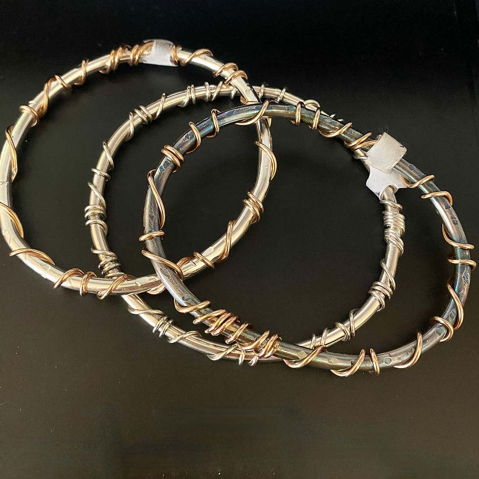 Thumbnail: Wrapped Bangle. Solid Silver with Gold Plated Copper Wrap