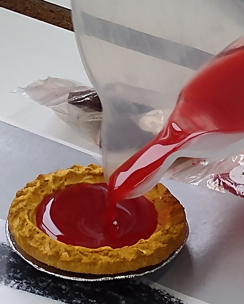 Pouring the jam for the tart