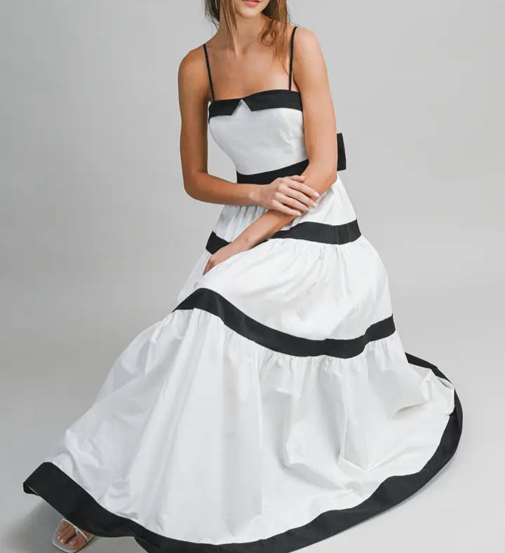 Black and white tiered maxi dress with detachable straps and fitted bodice