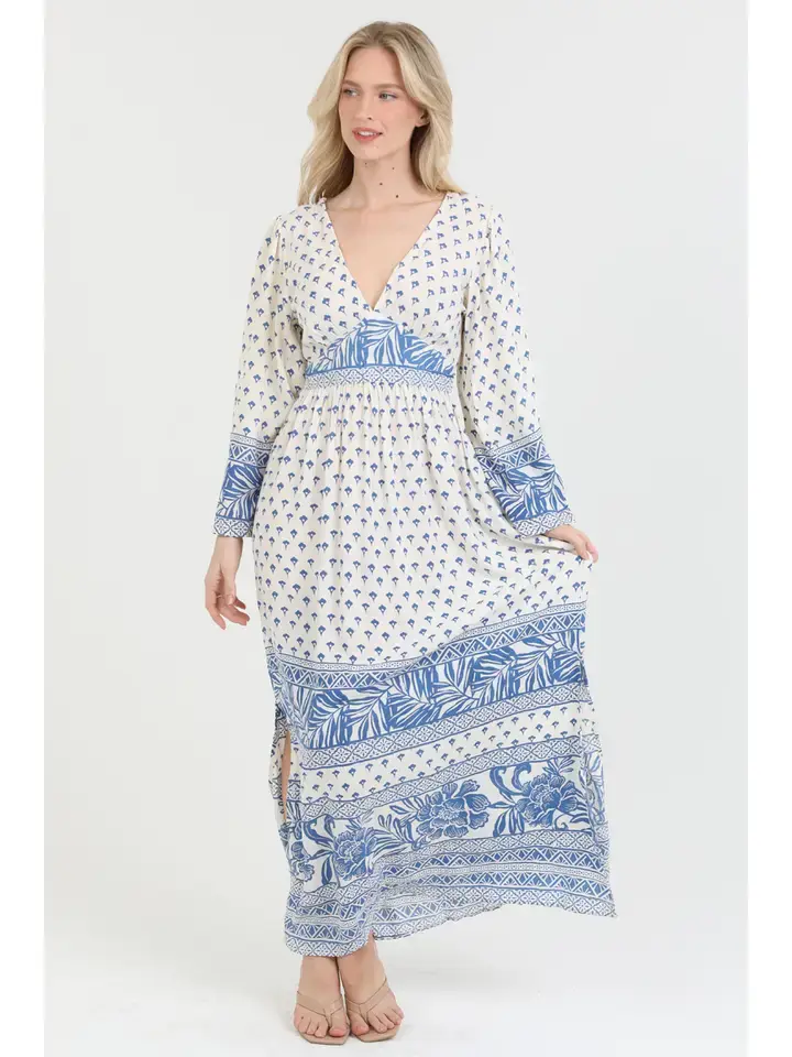 V-neck bell sleeve printed maxi dress by Nostalgia with flowing bohemian silhouette