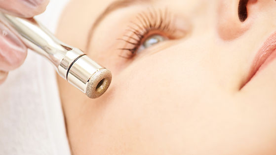Microdermabrasion clinic treatment. Aesthetic facial procedure. Diamond face clean. Medici