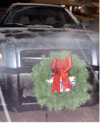 Wreath hung on the authors car