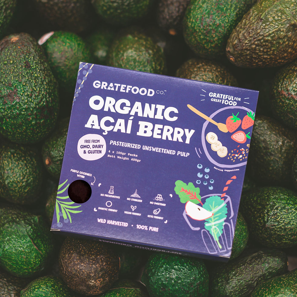 a box of gratefood acai unsweetened on a bed of avocados
