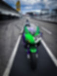 Rennstrecken Motorrad Honda CBR 600rr foliert in grün/ lila. Steht in der Boxengasse vom Hockenheimring.