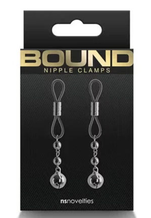 Black packaging with "BOUND NIPPLE CLAMPS" text. Features metal clamps with chains and silver accents. Mood is bold and edgy.