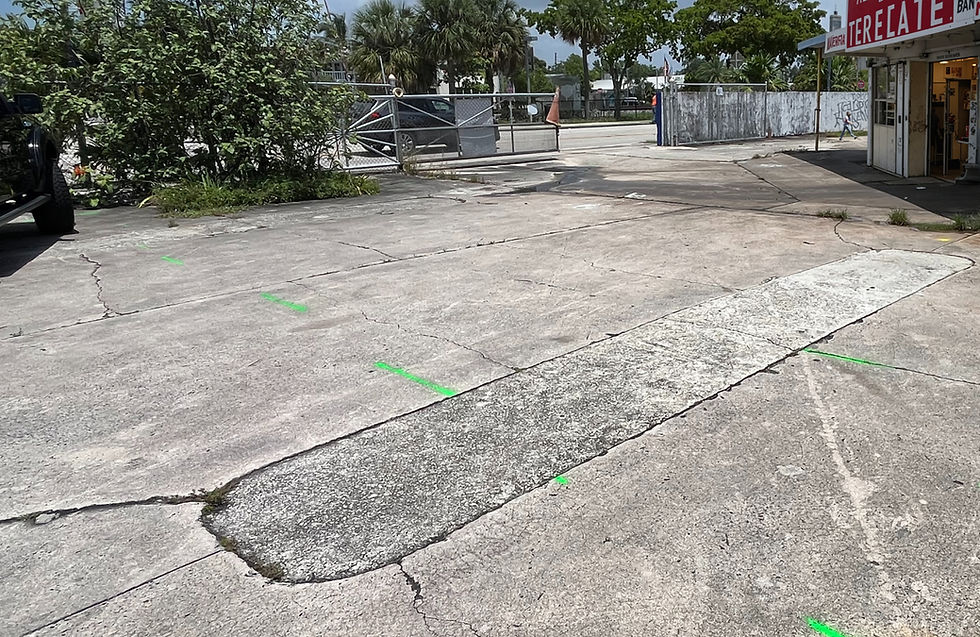 A former dispenser island was discovered during the Phase I ESA.