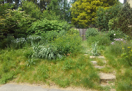Suburban Garden by J. Mitchell Gardens and Stone
