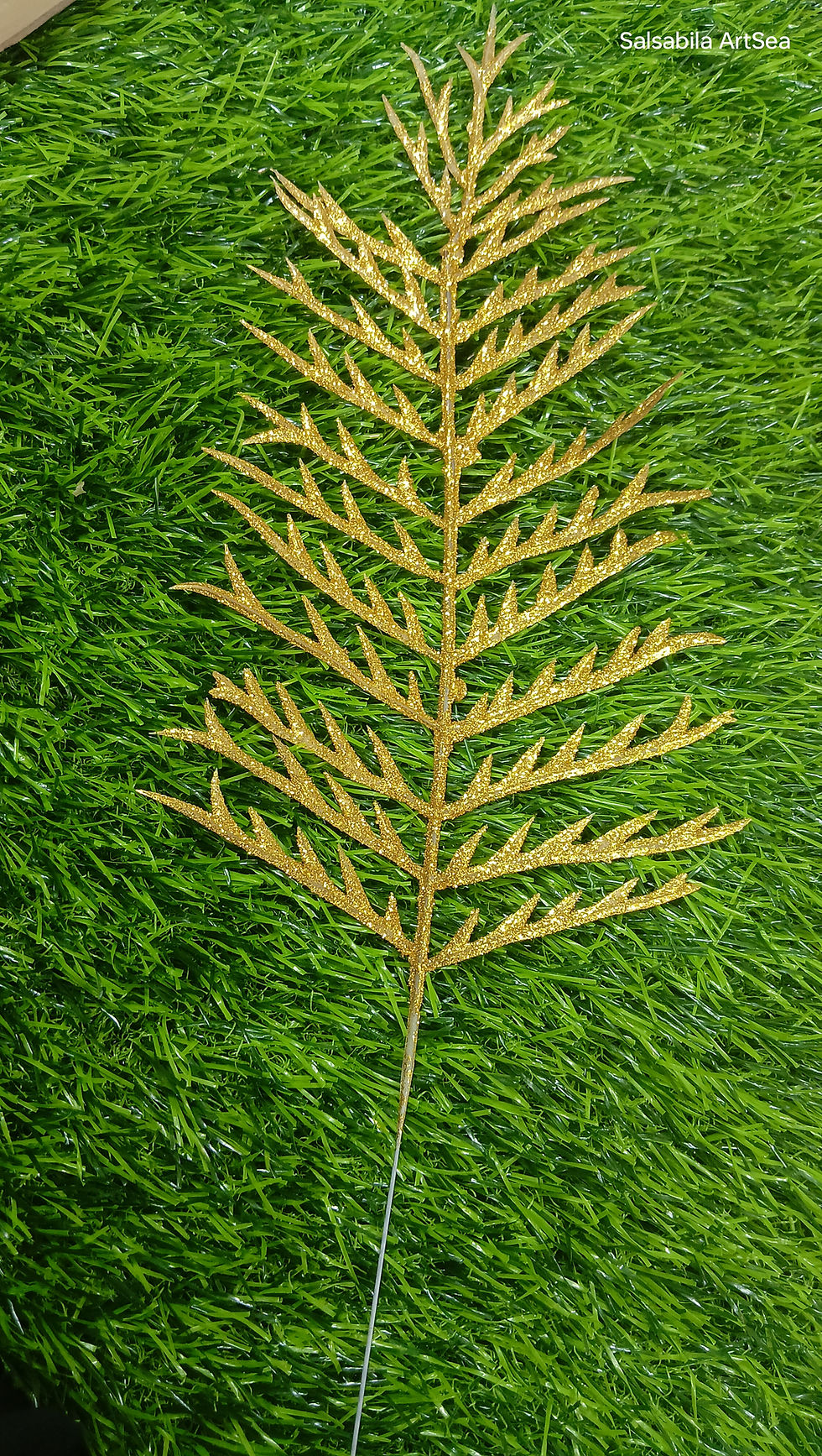 Artificial golden fern leaves