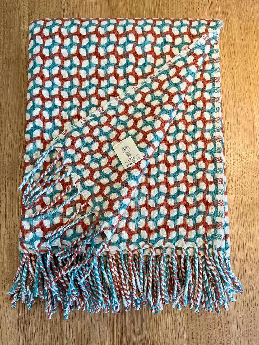 Wolldecke Gathering von Burel factory aus Portugal in beige mit terracotta und türkis