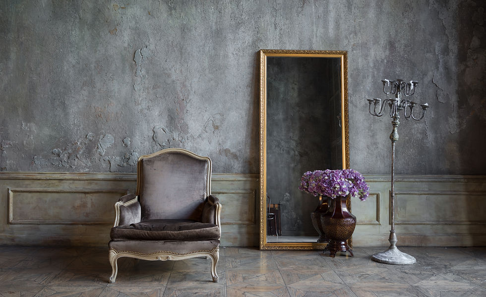In the room are antique mirror and a chair.jpg