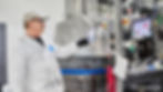 A worker makes paint at Pepin Industries