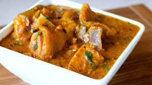 Thumbnail: Molded meal with Ogbono Soup and Chicken