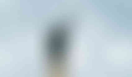 Sousoší na sloupu u Michelské plynárny mělo propagovat plynofikaci; vzniklo ve 30. letech 20. století