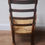 Thumbnail: Antique Rush Seated Stripped Oak Bobbin Rocking Chair