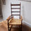Thumbnail: Antique Rush Seated Stripped Oak Bobbin Rocking Chair