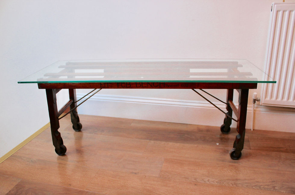 Thumbnail: Glass Topped Coffee Table with Wooden Base on Castors.