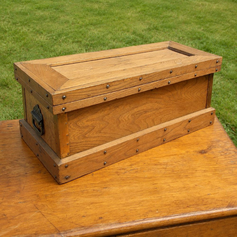 wooden storage case with recessed top, metal nailheads, and decorative side handle