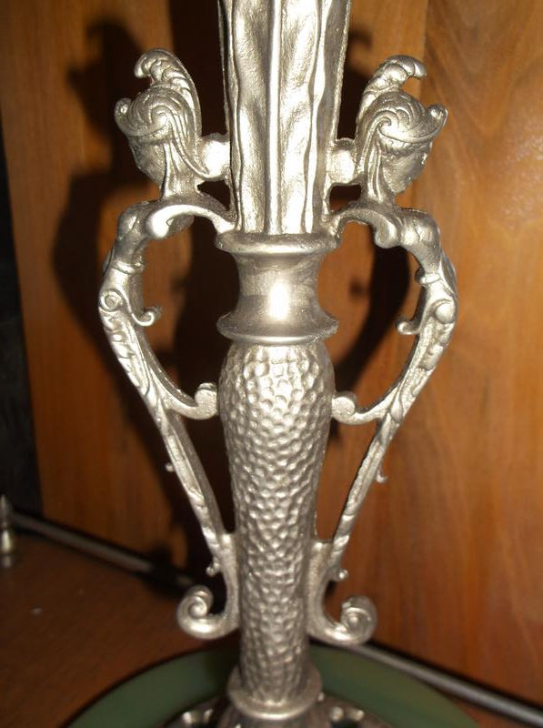 Thumbnail: Ornate metal candlestick with textured column