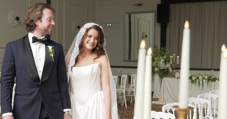 Bride and groom admiring their elegant wedding reception décor at Château de la Valouze.