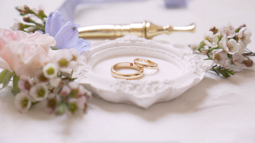 cinematic shot of wedding rings and details