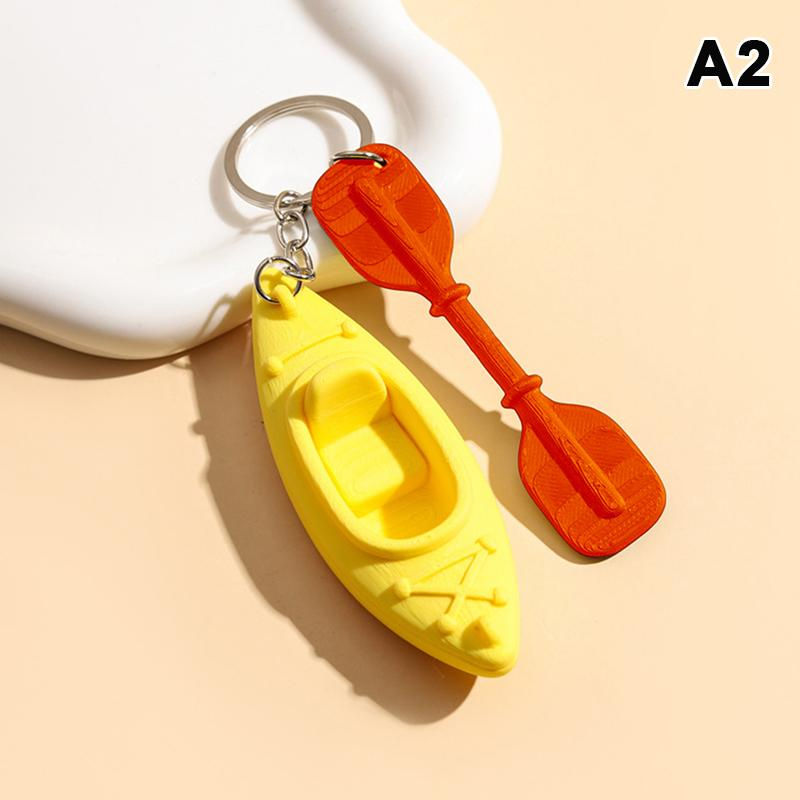 Thumbnail: Mini Kayak Keychain With Matching Paddle And Vibrant Multicolor Design Perfect F