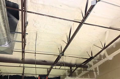 Commercial closed-cell spray foam installation by Wild Elements Solutions in Tampa, FL, providing superior insulation, moisture resistance, and structural reinforcement for long-lasting performance.