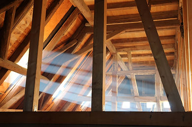 Image of an attic space to demonstrate an area that can receive eco-friendly sanitization fogging to eliminate allergens, mold spores, and contaminants for a cleaner, healthier home.