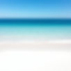only white sand and blue ocean calm waters.jpg