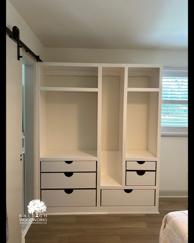 Sophisticated and Functional White Custom Wardrobe (open) | Raleigh Woodworks