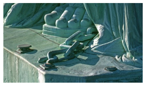 "The broken shackles at the feet of the Statue of Liberty symbolize freedom from oppression and the enduring journey toward liberty and opportunity." Image courtesy of the National Park Service, Statue of Liberty National Monument.