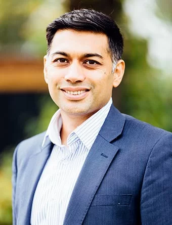 A picture of a Arun Chauhan smilin, Founder of Tenet
