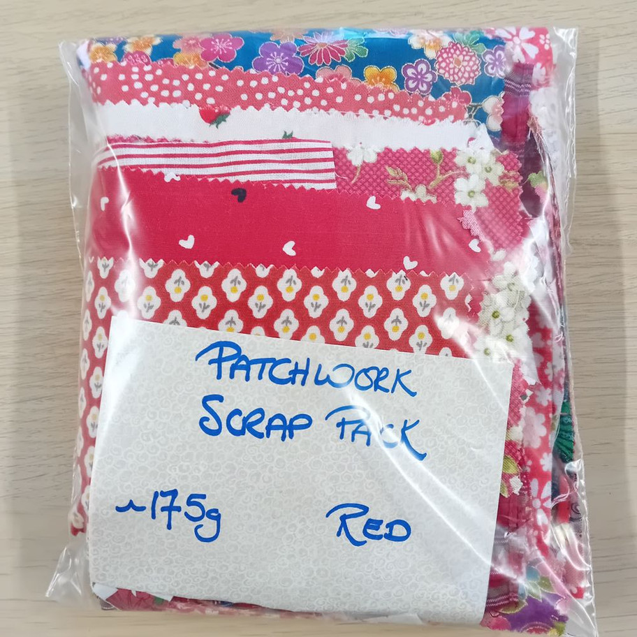 Pieces of fabric in a see-through bag - these are red