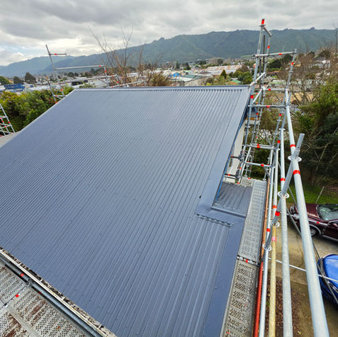 Residential metal re-roof installation in progress by SJ Roofing in Wellington
