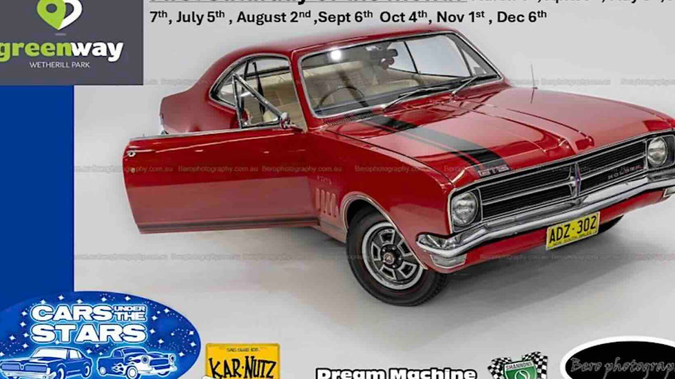 Red classic car with black stripes on display. Background features "greenway Wetherill Park" logo and "Cars Under the Stars" banner.