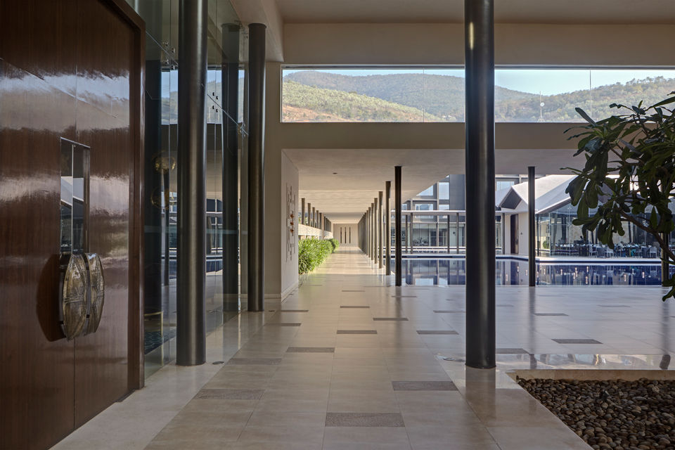 The colonnaded corridor in The Dasavatara Hotel, hospitality architecture