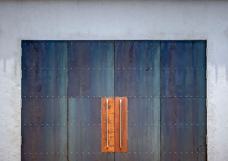 large industrial doors, custom design, MS sheets, industrial look, wood accents
