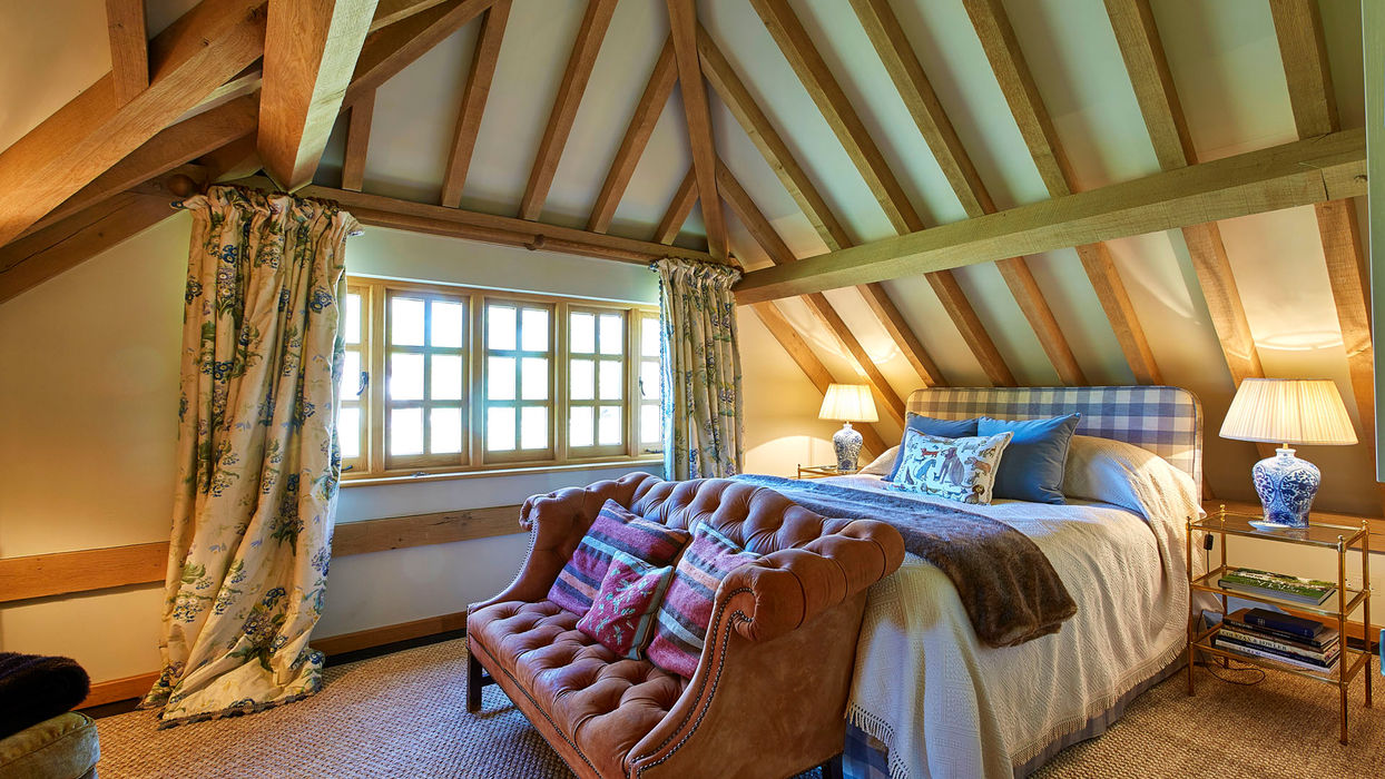 Charming loft bedroom in the oak guest lodge barn in Tadley by Hartwood Oak, designed for comfort and relaxation.