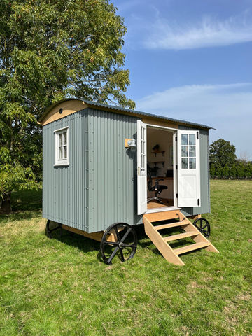 A charming tiny oak house crafted by Hartwood Oak in Berkshire for a unique living experience.