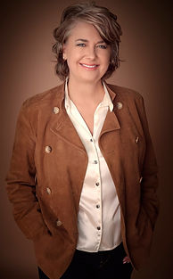 Lori Crever Portrait suede jacket cropped-brightened.jpg