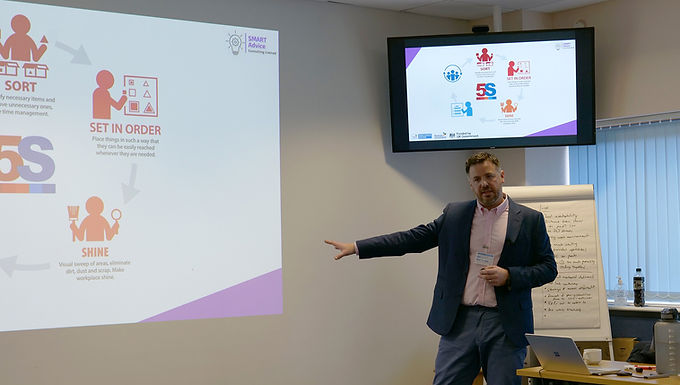 Image of a lean six sigma black belt delivering training