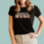 Close-up of a black cotton t-shirt featuring the orange and yellow graphic text "Ser Bilingüe es un Superpoder," designed for