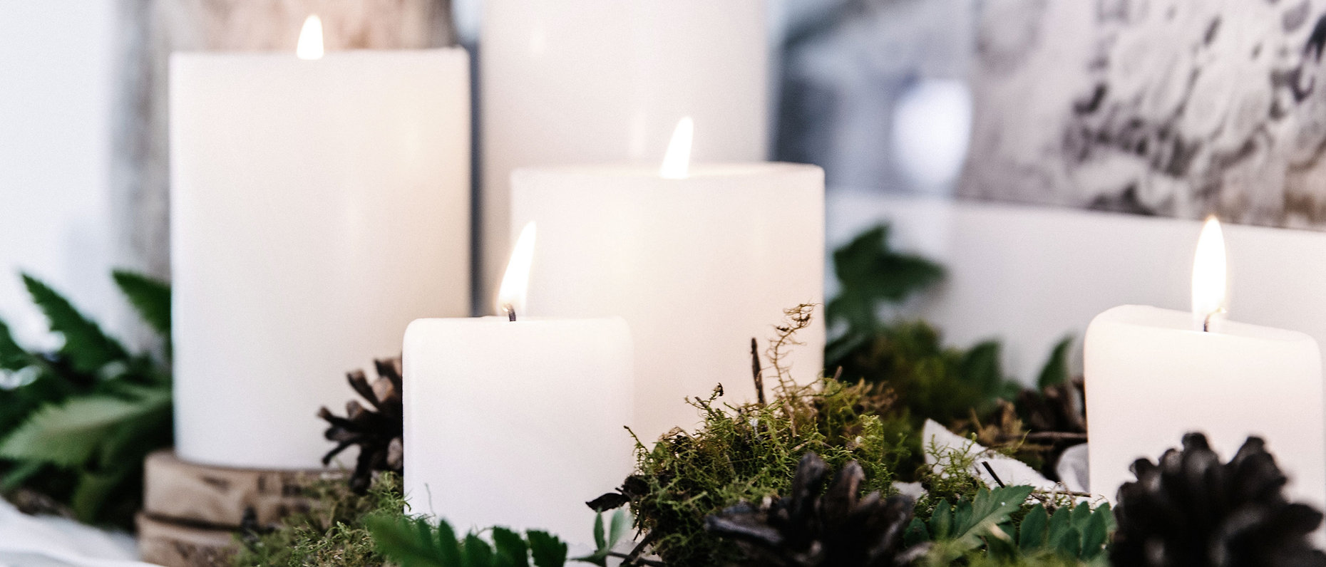 White Candles with Plant Decor